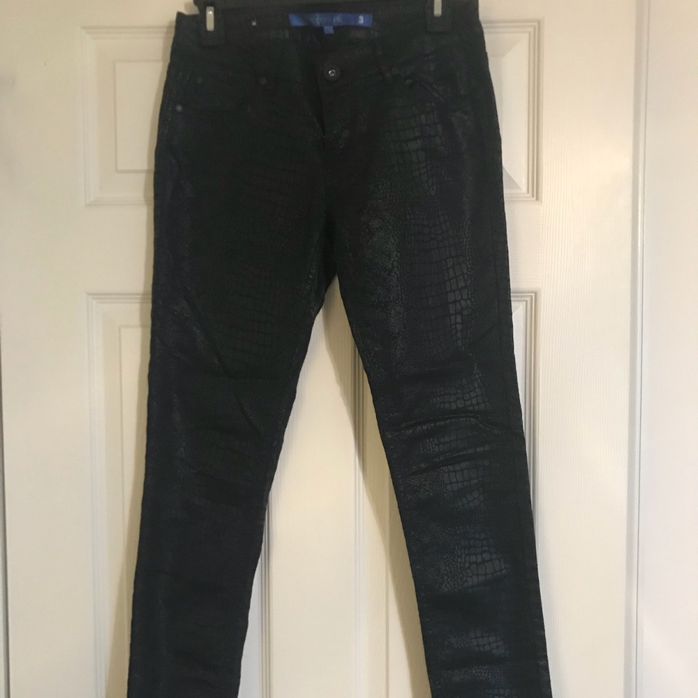 Black leopard skinny jeans